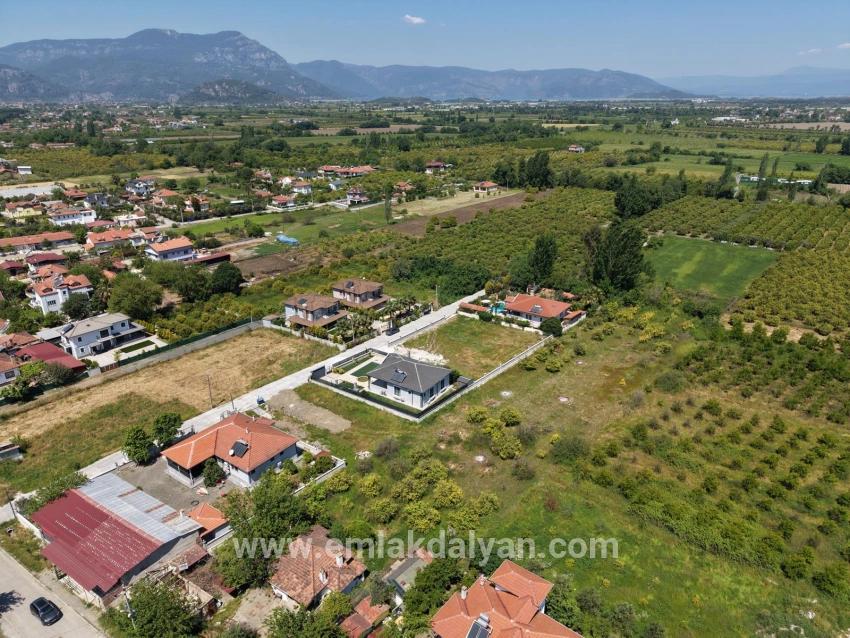 Для продажи Сюжет в Okçular Ortaca - Под Жилье застройку - 1.050 m²