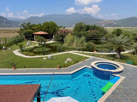 Роскошная Вилла С 4 Спальнями И 1 Ванной Комнатой Продается На Участке Площадью 7000 М2 С Видом На Пляж Далян Истузу.